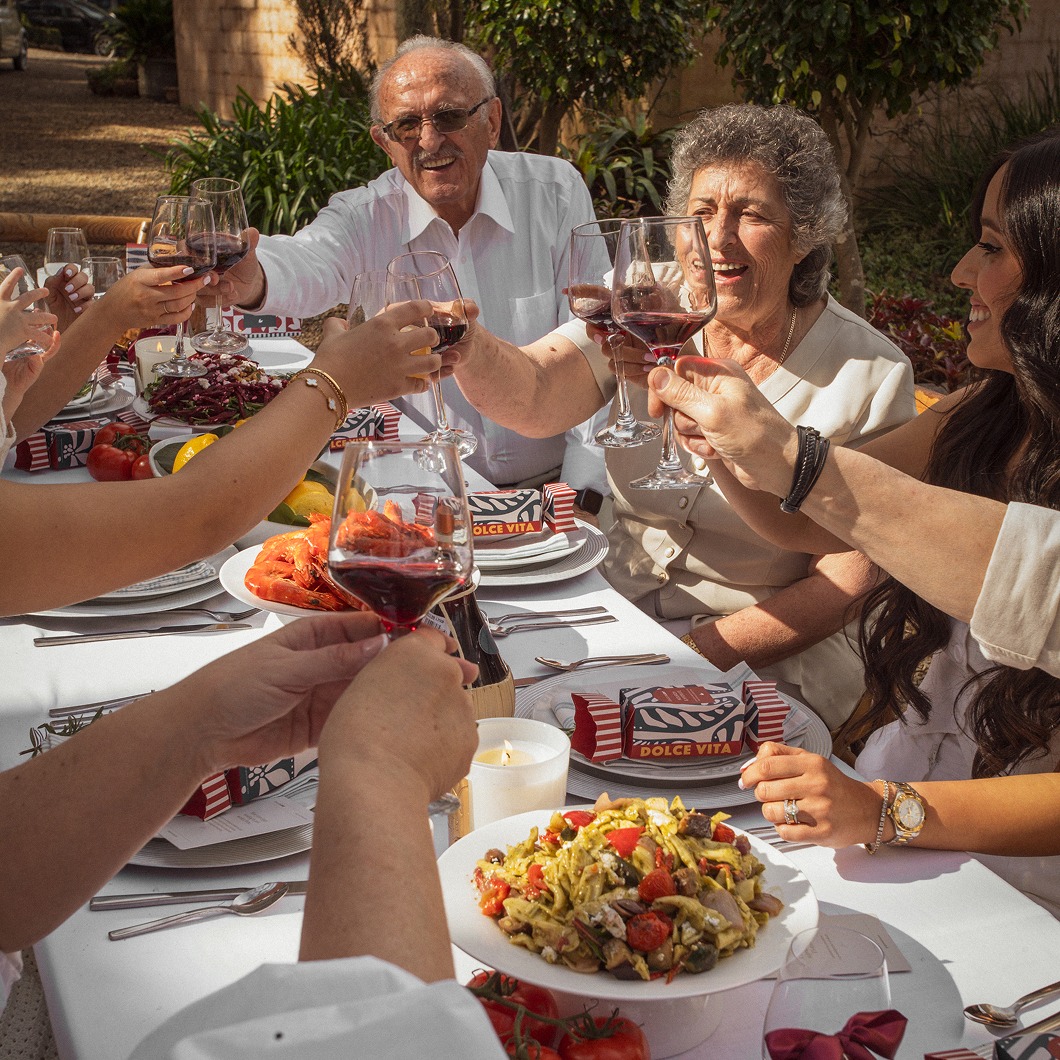 Family toasting at Christmas table