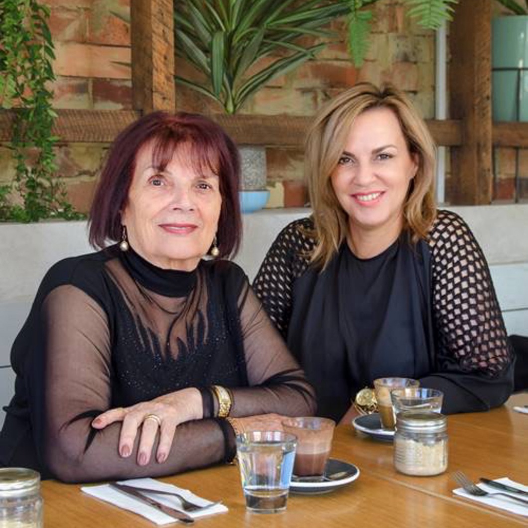 Maria and her mother at a cafe